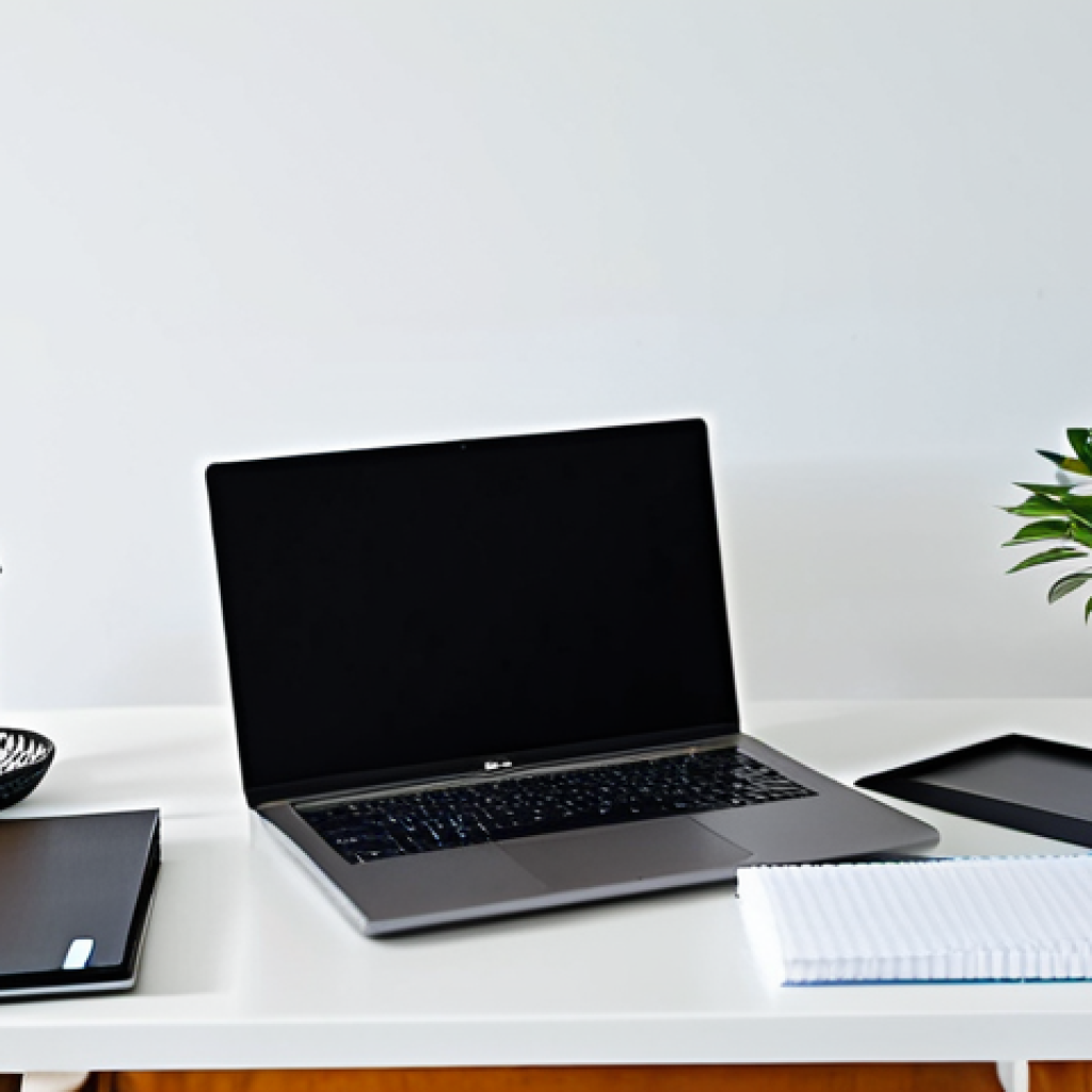 디지털 일몰 프로토콜과 데이터 관리 - Organized Digital Workspace**
"A clean and organized home office setup in Thailand, featuring a lap...